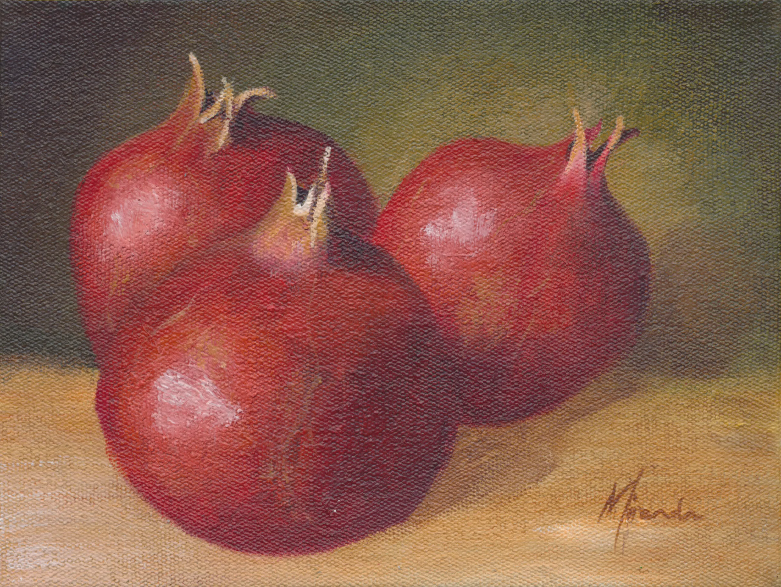 Watercolour painting of pomegranates by Miranda Gerber